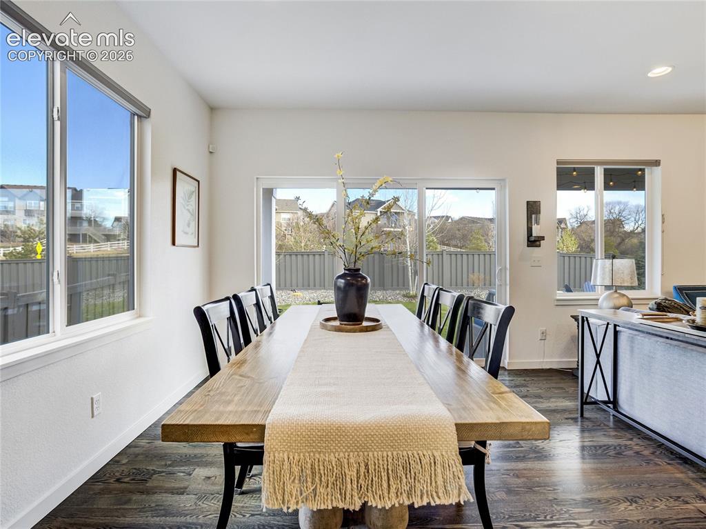 Image 21 of 50: Dining area is just steps from the kitchen & covered back porch