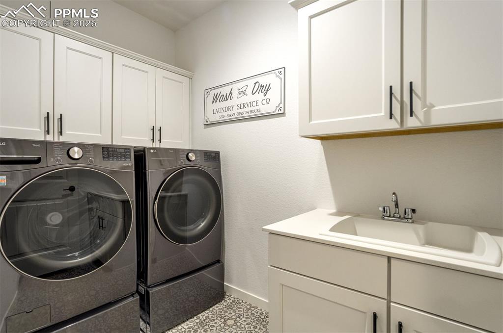 Image 27 of 46: Other bespoke touches in the home include decoartive tile flooring in the 5