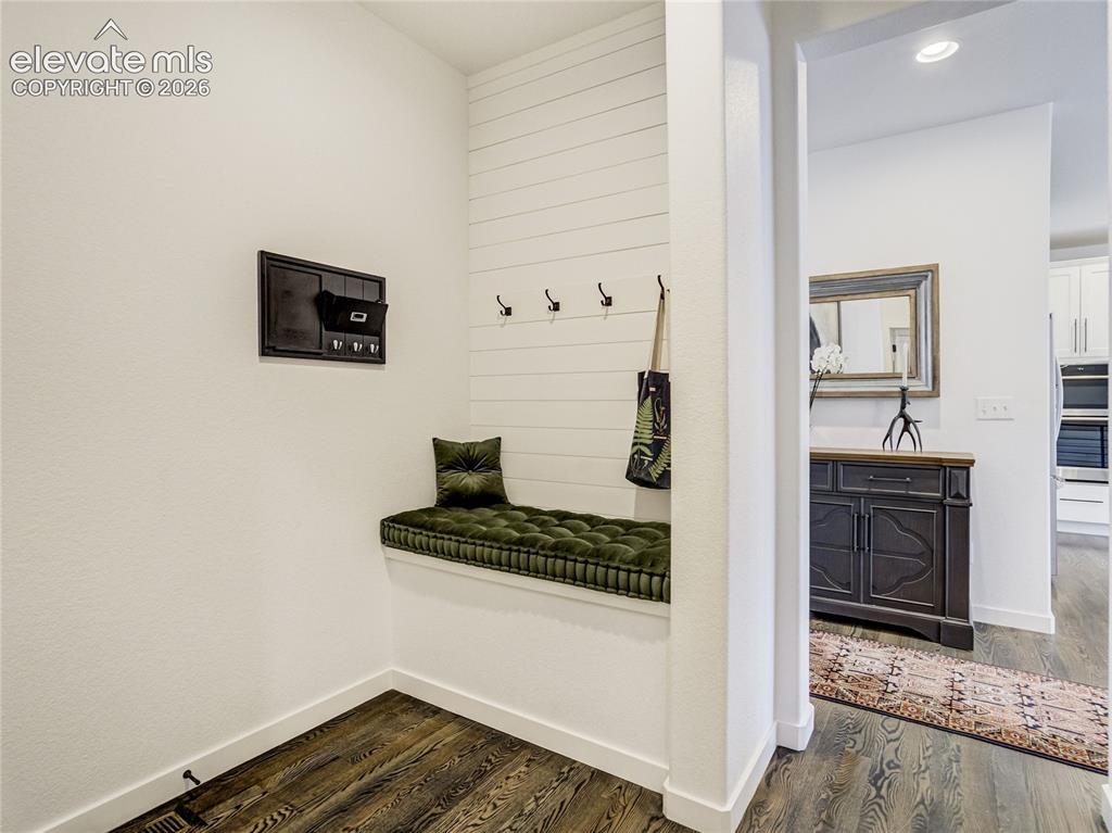 Image 28 of 50: Just steps from the garage, the mud-room pairs convenience with great atten