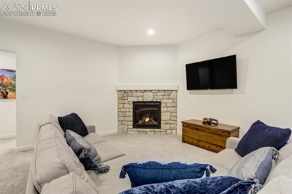 Image 29 of 46: Settling in to soak with a good book & a candle or two, you