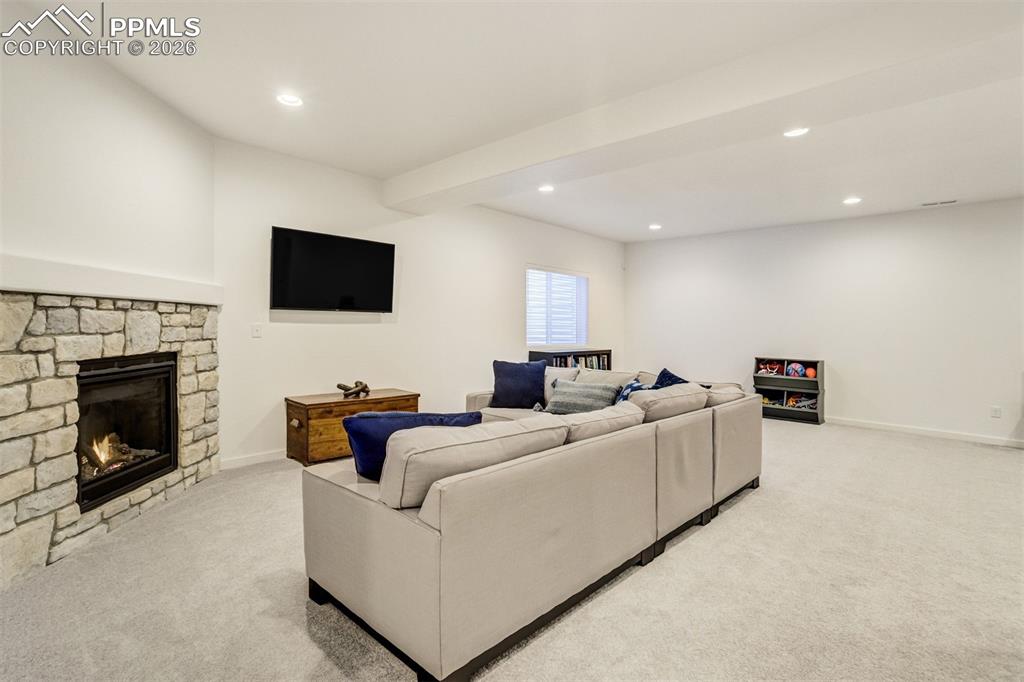 Image 30 of 46: Built in features like coat hooks & a boot bench make for practicality in t