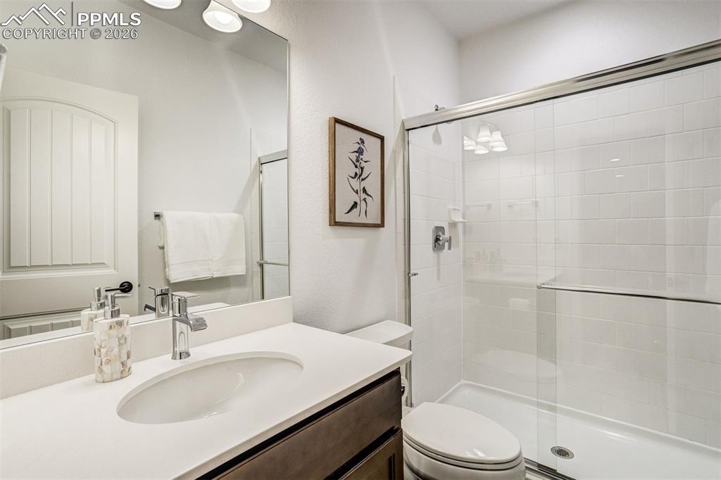 Image 32 of 46: Step downstairs to make good use of the spacious rec room or set it up as a