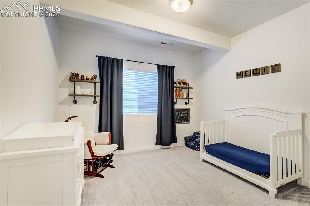 Image 33 of 46: Regardless how you use the space, the stacked stone gas fireplace is there