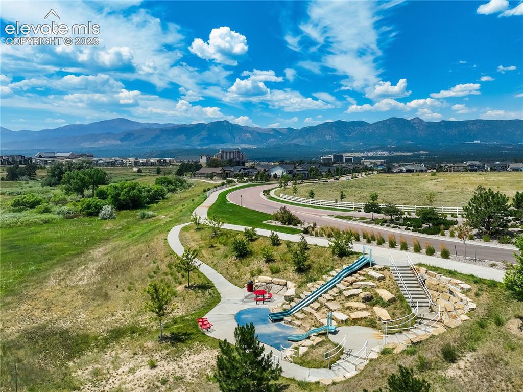 Image 48 of 50: Hill Slides, just one of the pocket parks in The Farm. For the young, & the