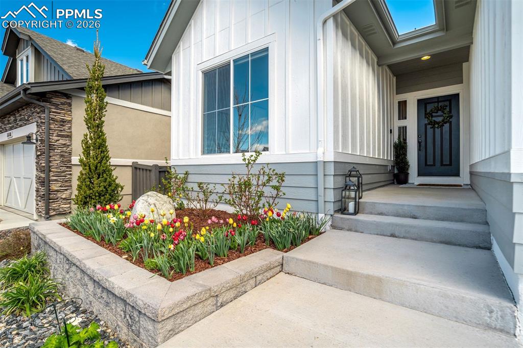 Image 7 of 46: The main-level primary retreat, with its soothing palette and elevated touc