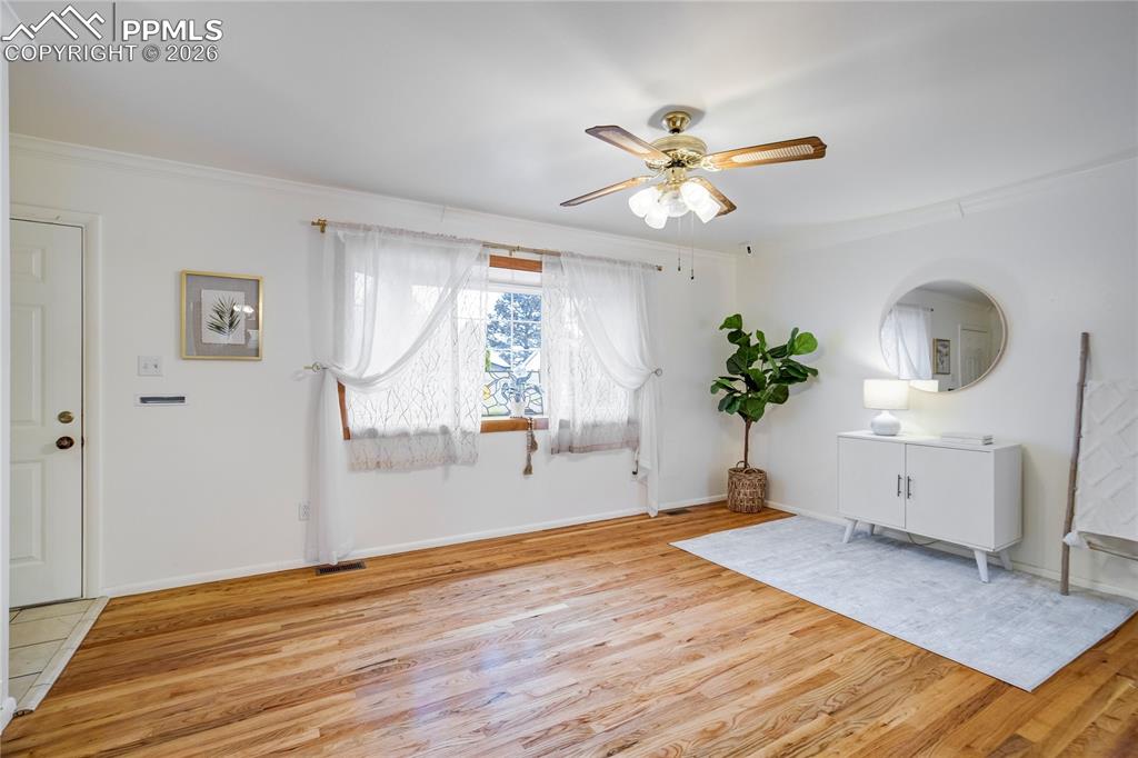 Image 2 of 41: Low maintenance yard and siding.  Extra driveway space