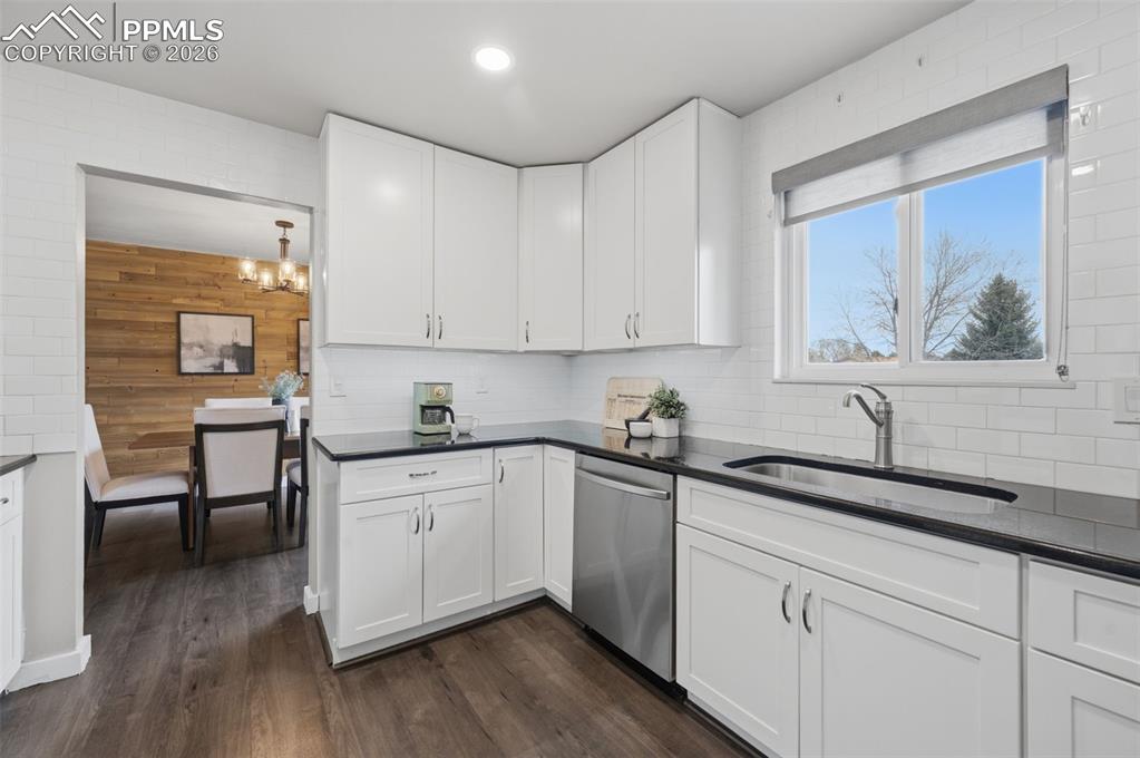 Image 13 of 50: Kitchen looking into dining room