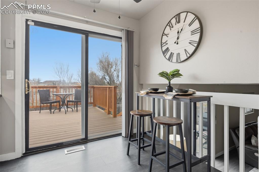 Image 17 of 50: Kitchen facing deck