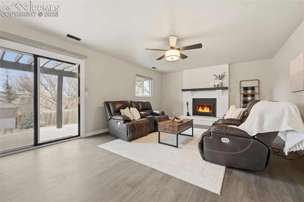 Image 19 of 50: Lower family room with walk-out to back yard