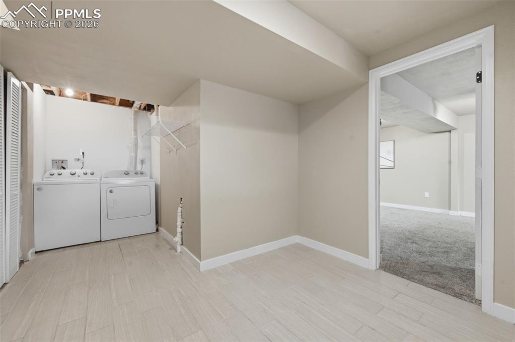 Image 24 of 50: Laundry in basement