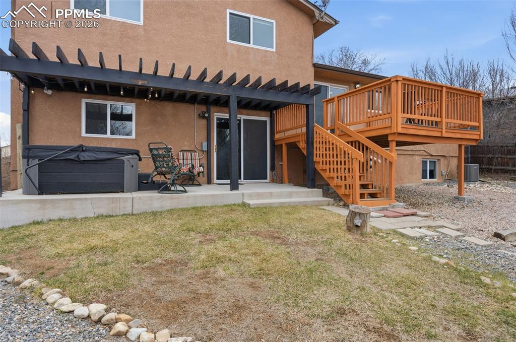 Image 43 of 50: Backyard angle view of house