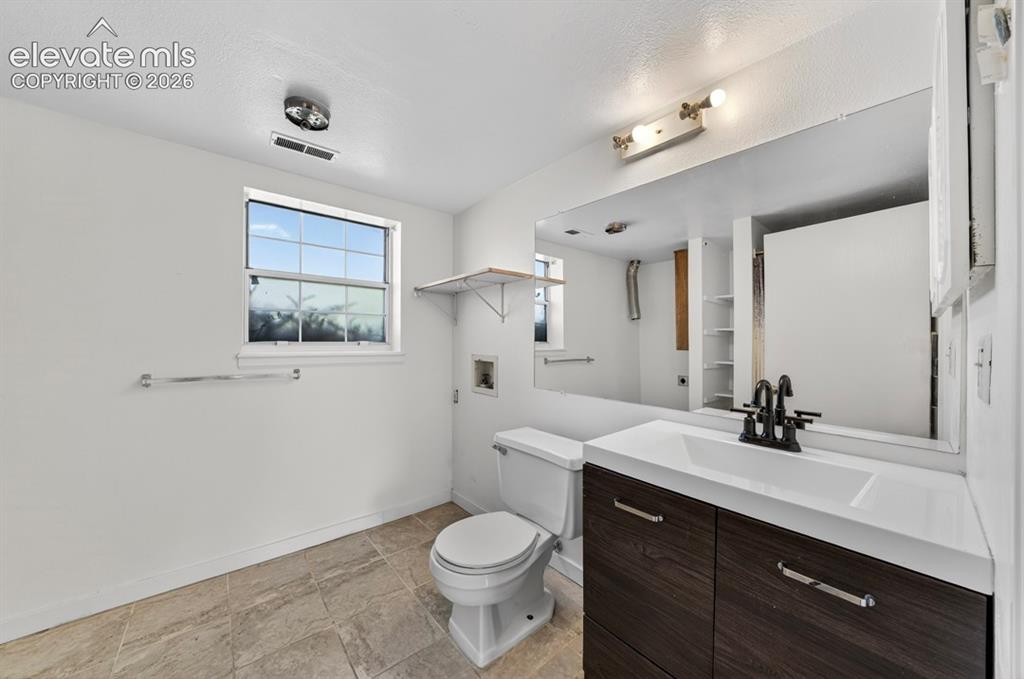 Image 23 of 30: llower level bathroom 