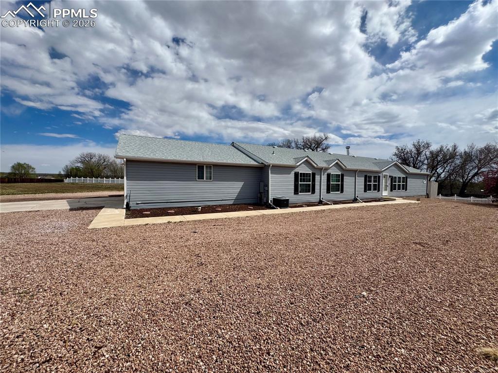 Caption: Sprawling rancher on 1/3rd acre