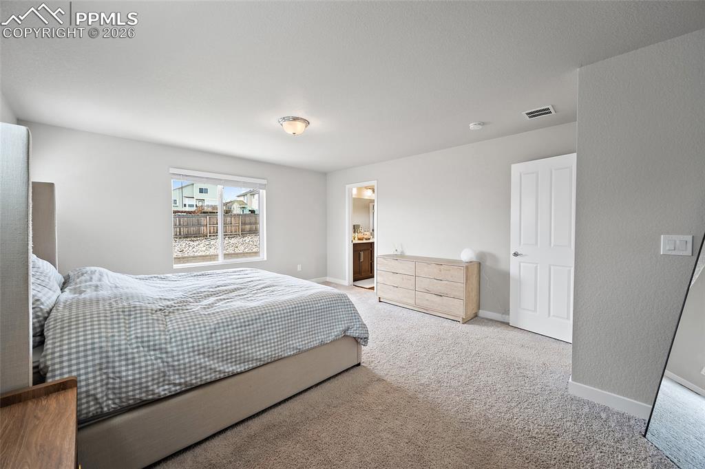 Image 21 of 49: Primary bedroom