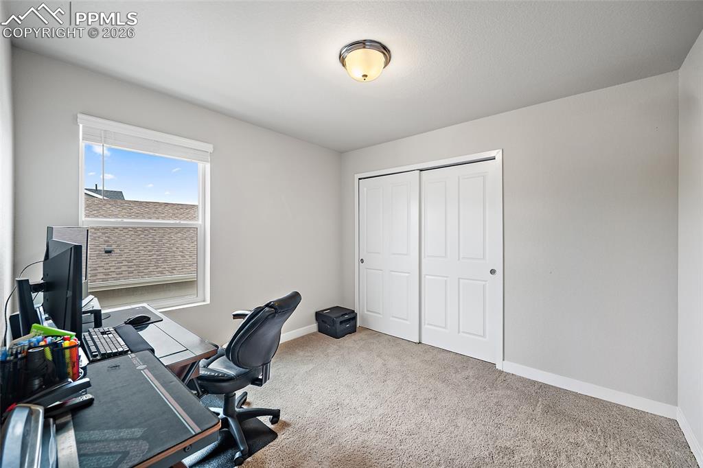Image 30 of 49: Spare bedroom upstairs
