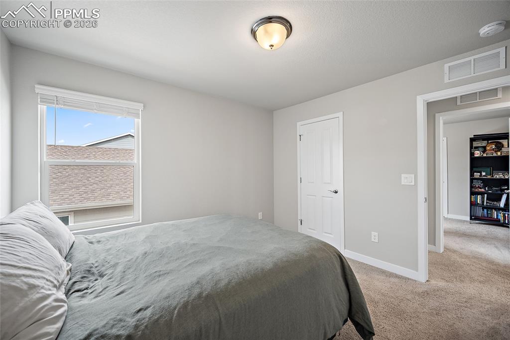 Image 34 of 49: Spare bedroom upstairs