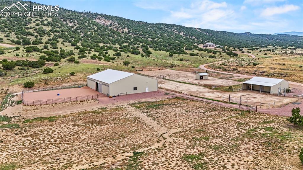 Image 7 of 41: View of rural area featuring a mountain backdrop