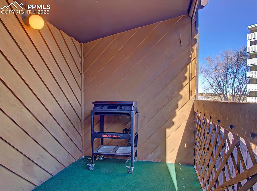 Image 10 of 30: Main level deck with grill. This unit is on the second floor for additional