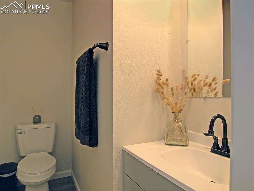 Image 13 of 30: Main level 1/2 bathroom