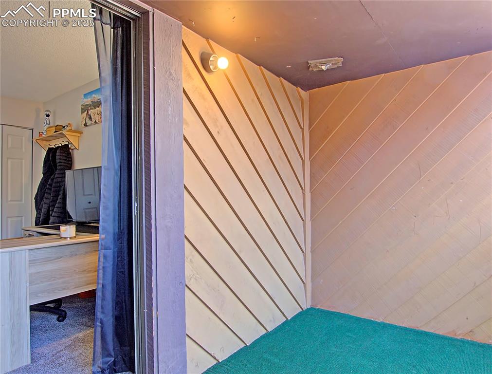 Image 19 of 30: Upstairs deck off office/second bedroom