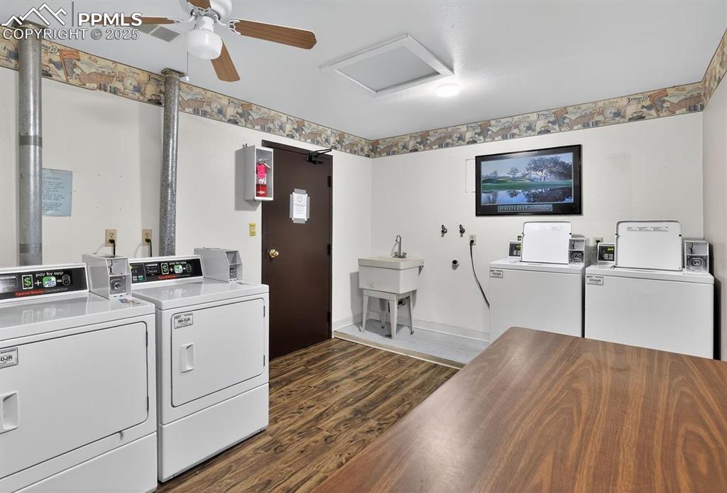 Image 23 of 30: Common laundry is located on the third floor or same level as the two bedro