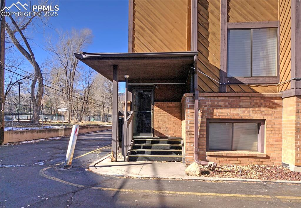 Image 25 of 30: Side entry to the condo complex