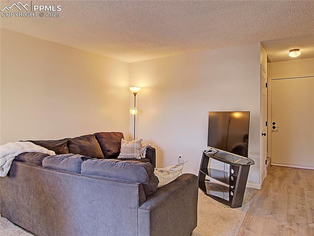 Image 4 of 30: New LVP in entry and kitchen