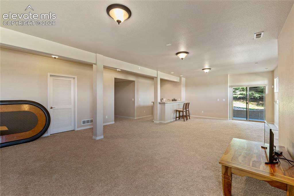 Image 19 of 31: Recreation room in basement
