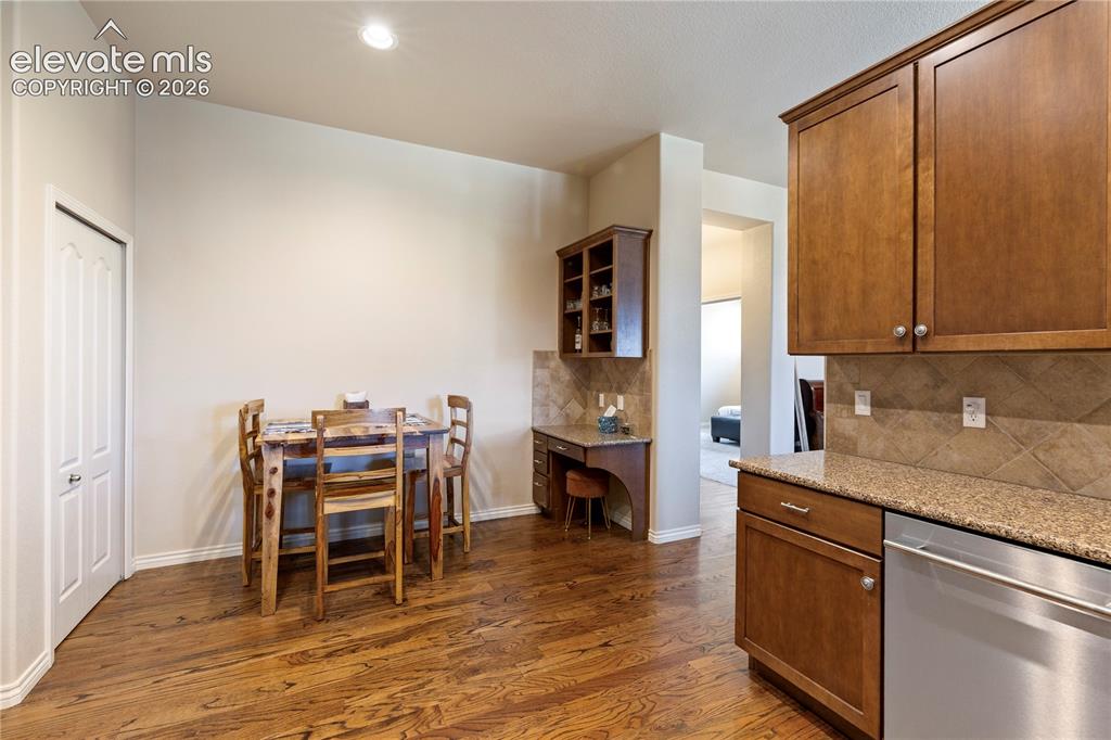 Image 9 of 31: Work station and eat in area off of kitchen