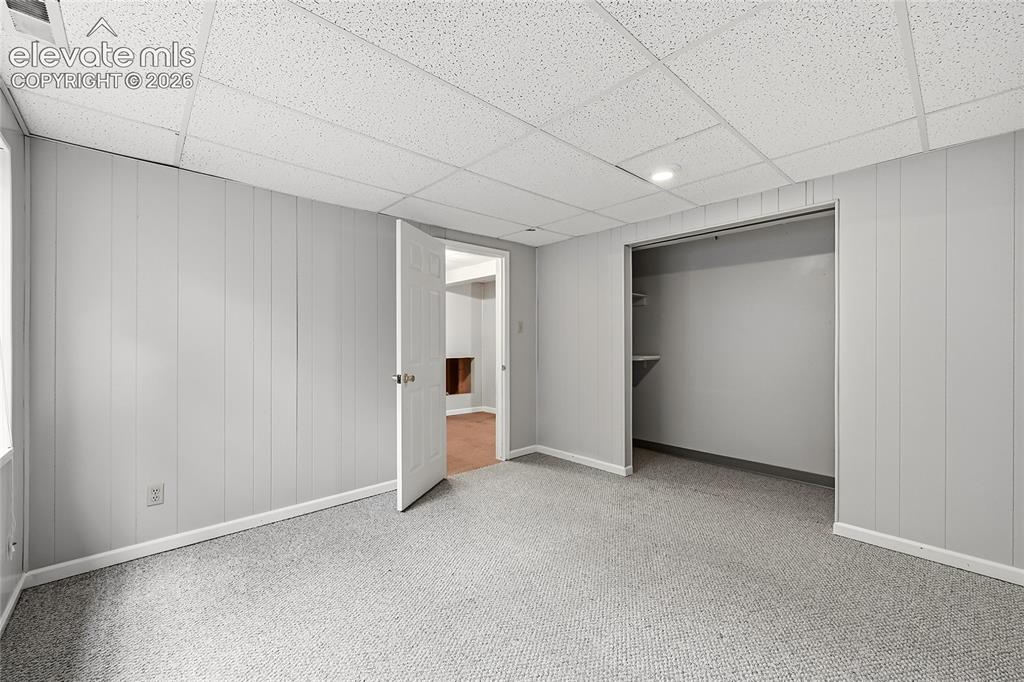 Image 22 of 27: Basement bedroom