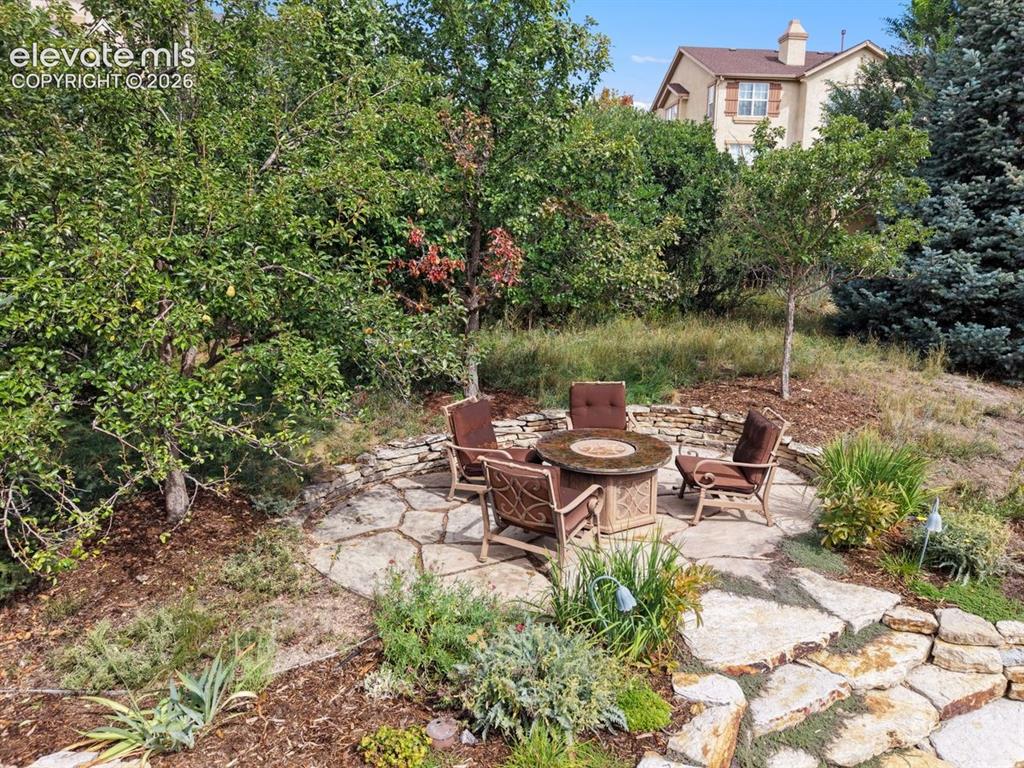 Image 37 of 50: Firepit area with included furniture