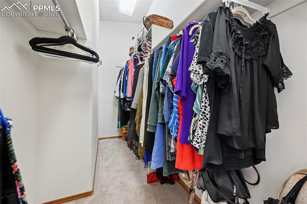 Image 26 of 43: Primary Walk-In Closet