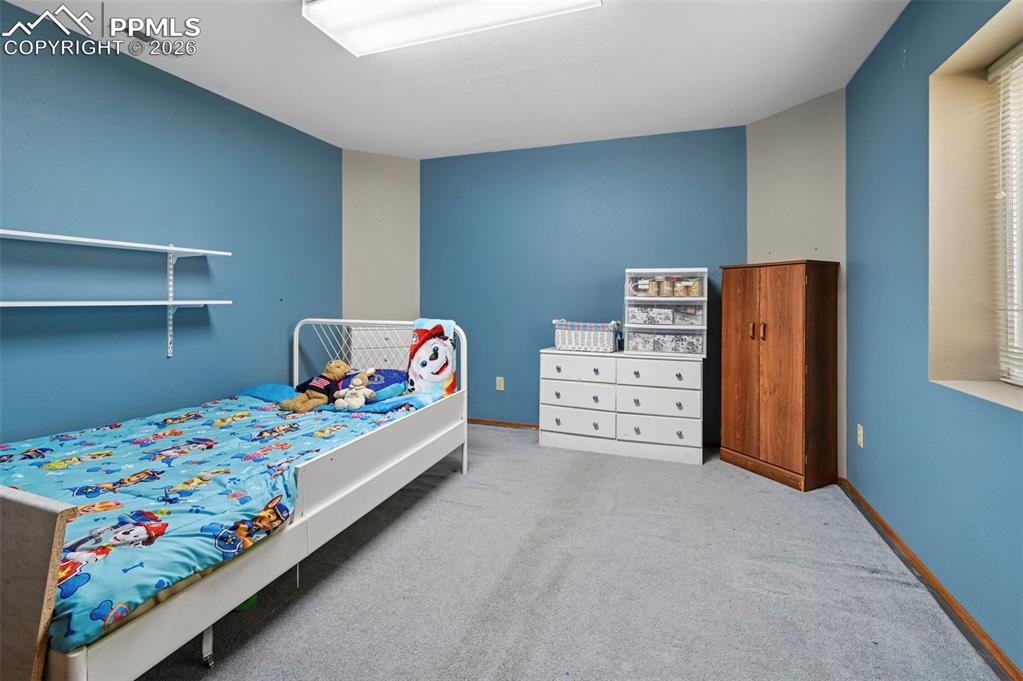 Image 34 of 43: Potential workout room or craft room.