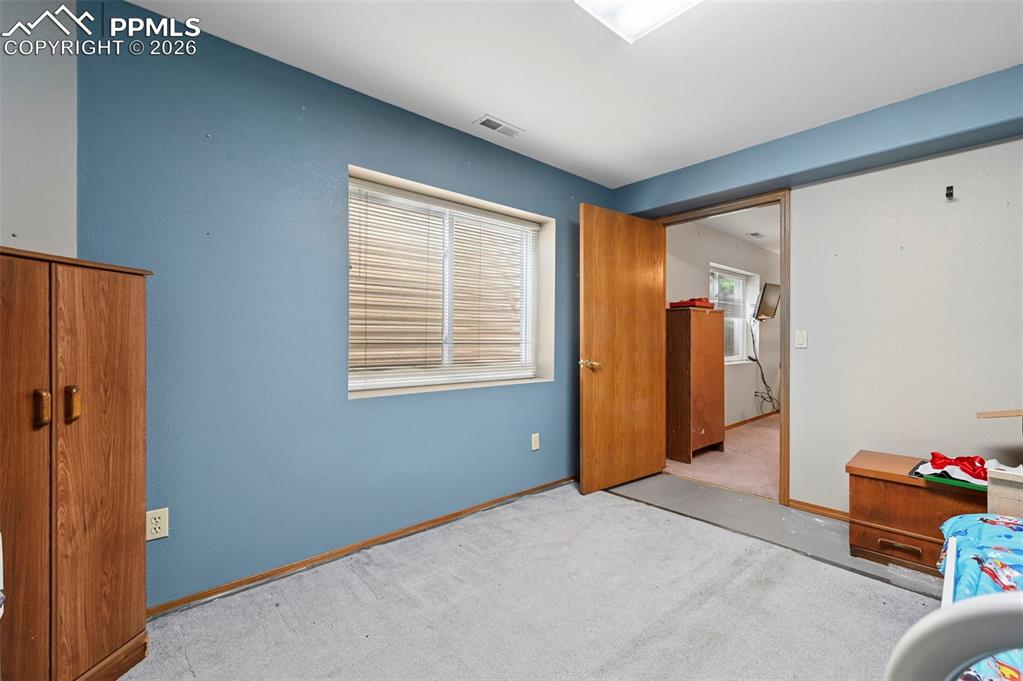 Image 35 of 43: Potential workout room or craft room.