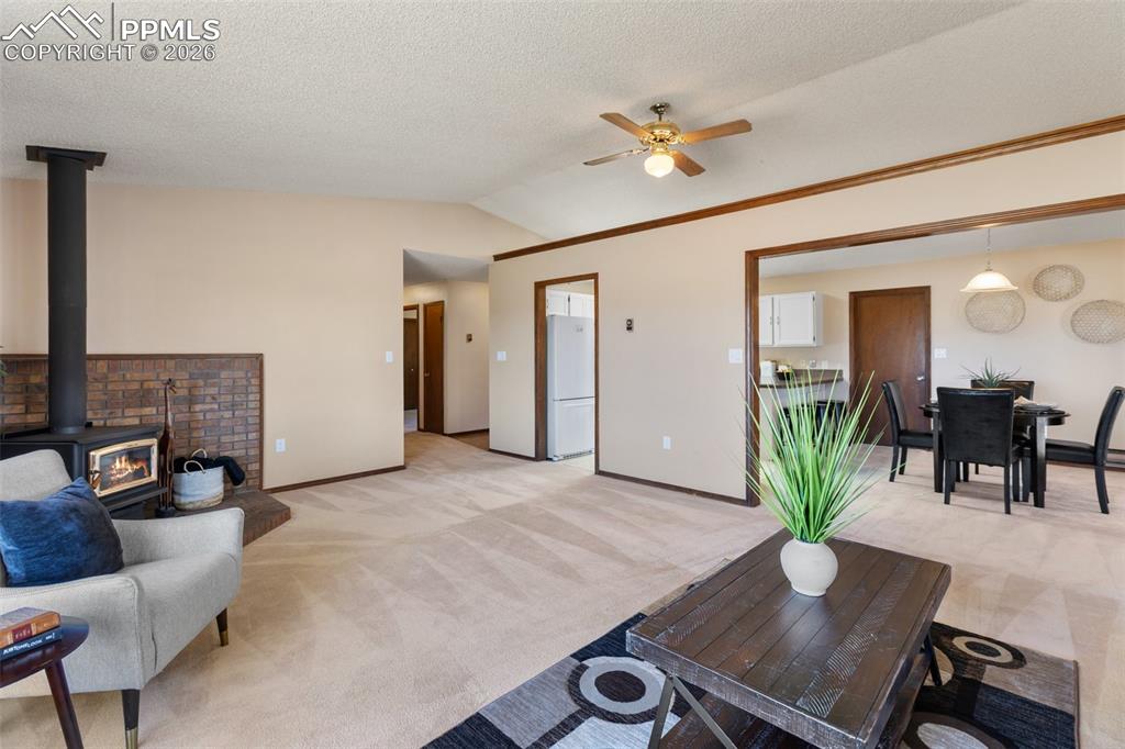Image 18 of 50: Spacious living room with amazing mountain views