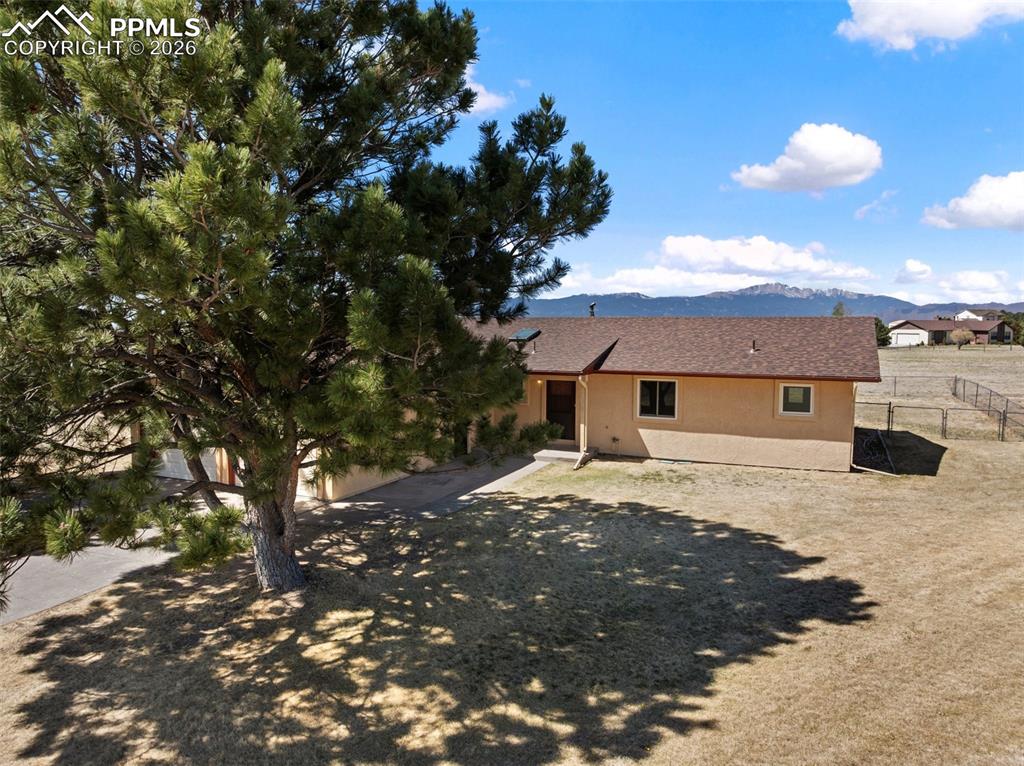 Image 3 of 50: 3 bedroom, 2 bathroom plus sunroom ranch home situated on 5.3 acres. 