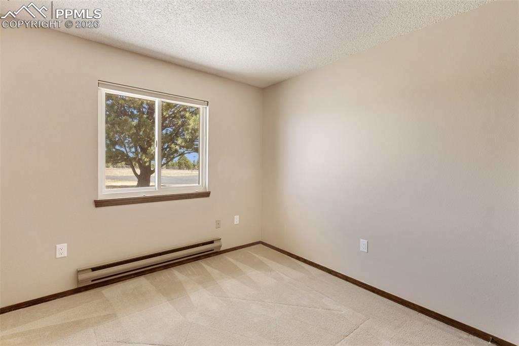 Image 39 of 50: One of 3 bedrooms - this one features Pikes Peak views. 