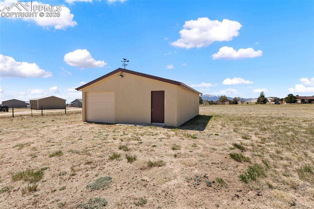 Image 47 of 50: Laundry/mud room - there is also a pantry area here.