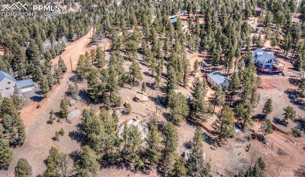Caption: Aerial view of property and surrounding area