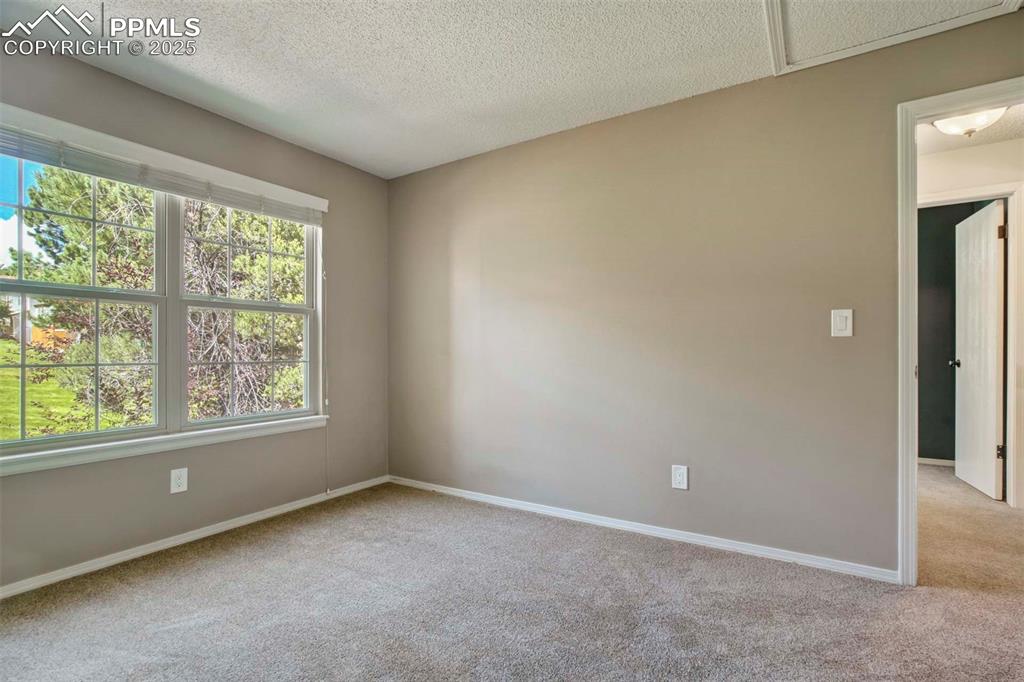 Image 16 of 36: Upper Level Bedroom