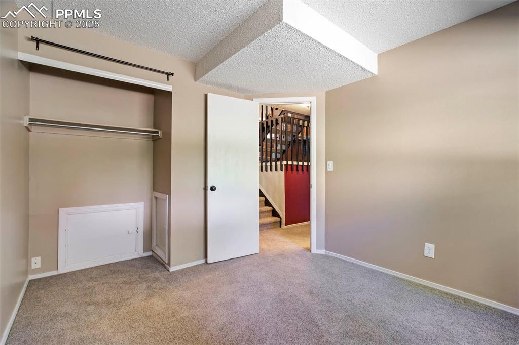 Image 23 of 36: Lower Level Bedroom