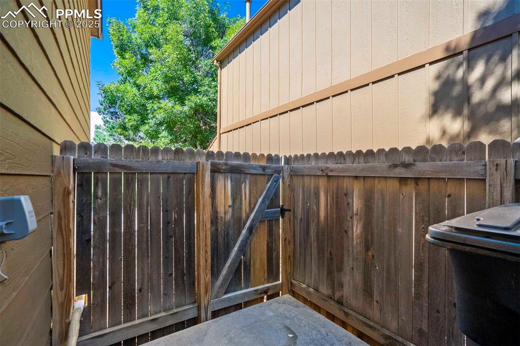 Image 24 of 36: Patio, with Storage Closet