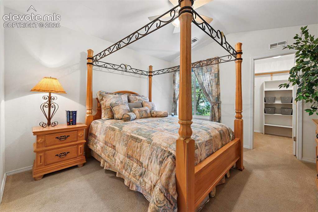 Image 13 of 48: primary bedroom with large walk-in closet