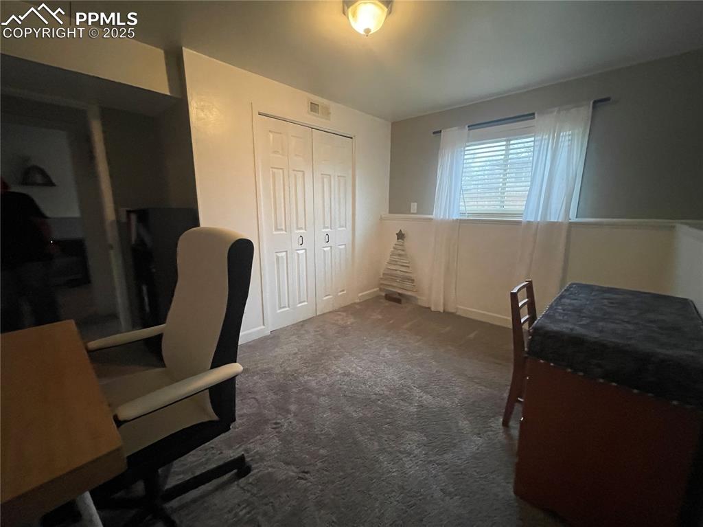 Image 23 of 38: Bedroom