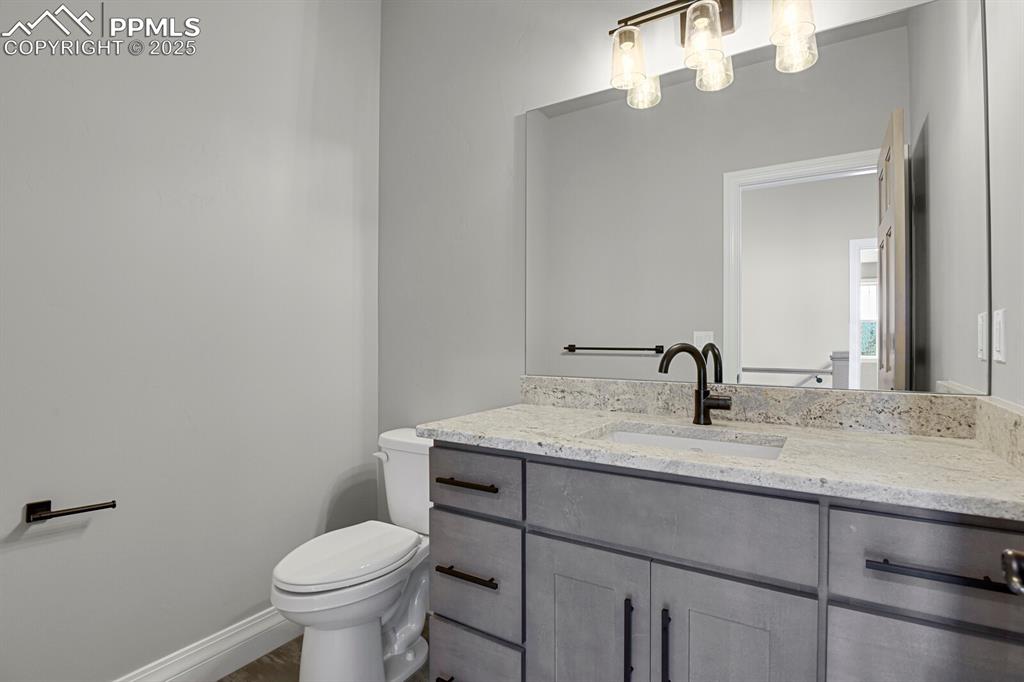 Image 23 of 44: Powder room on main level