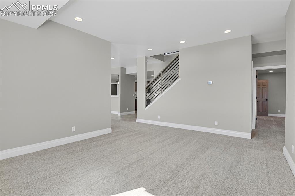 Image 30 of 44: Second famiy room - bonus room in basement