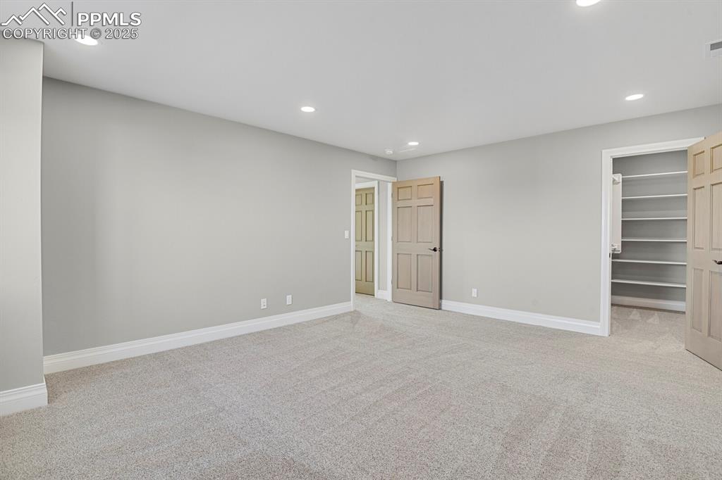 Image 39 of 44: Bedroom #5 walk-in closet and entry