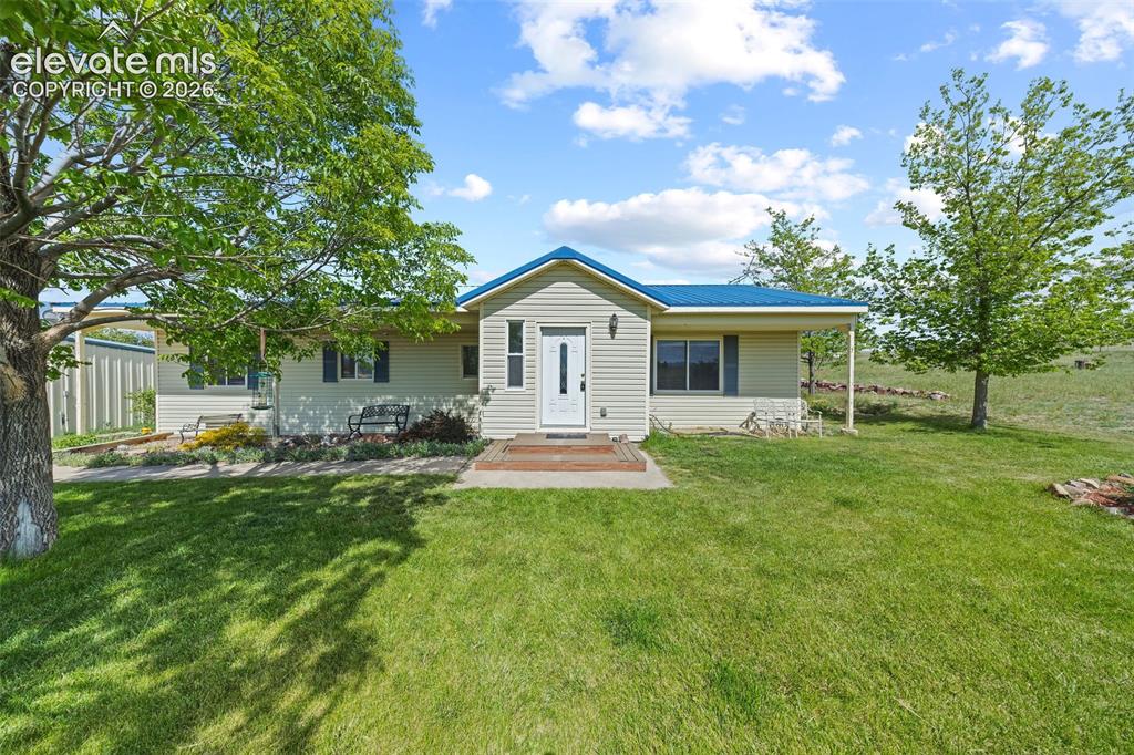 Image 1 of 40: Front of house with manicured lawn