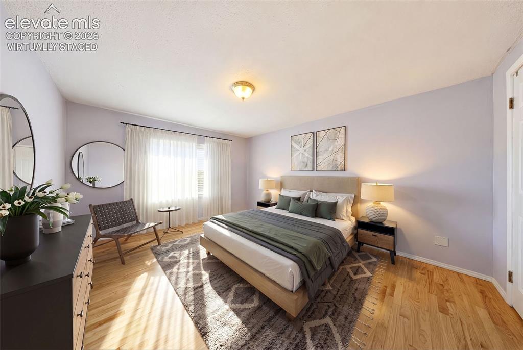 Image 15 of 40: Master Bedroom virtually staged.