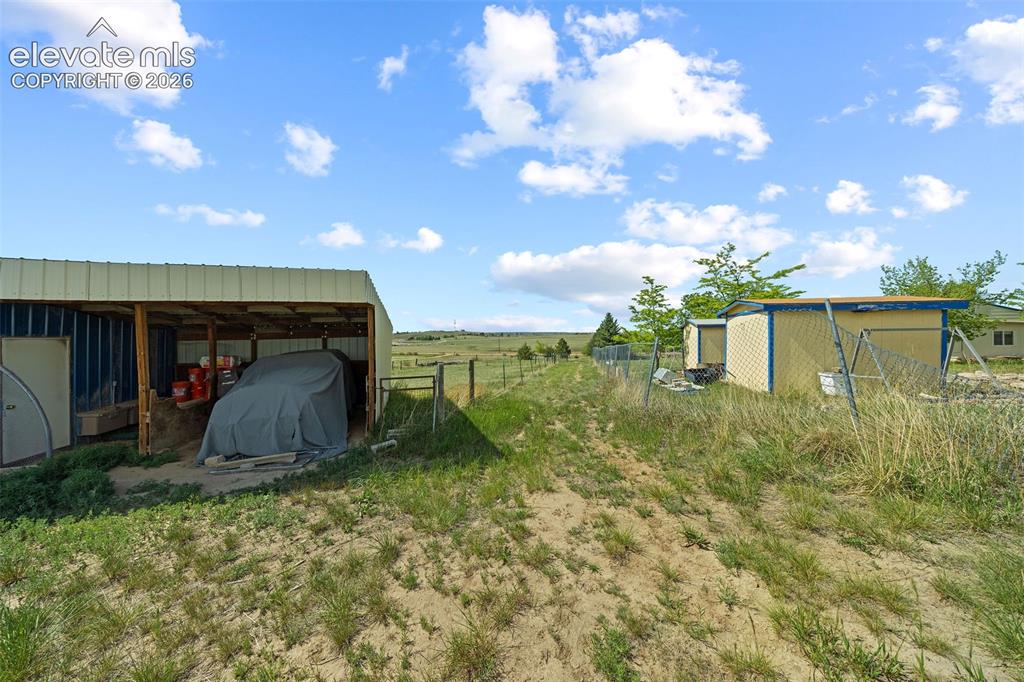 Image 33 of 40: Horse stalls and tack room